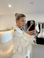 White denim trench coat