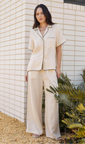 Black trim linen pants in cream