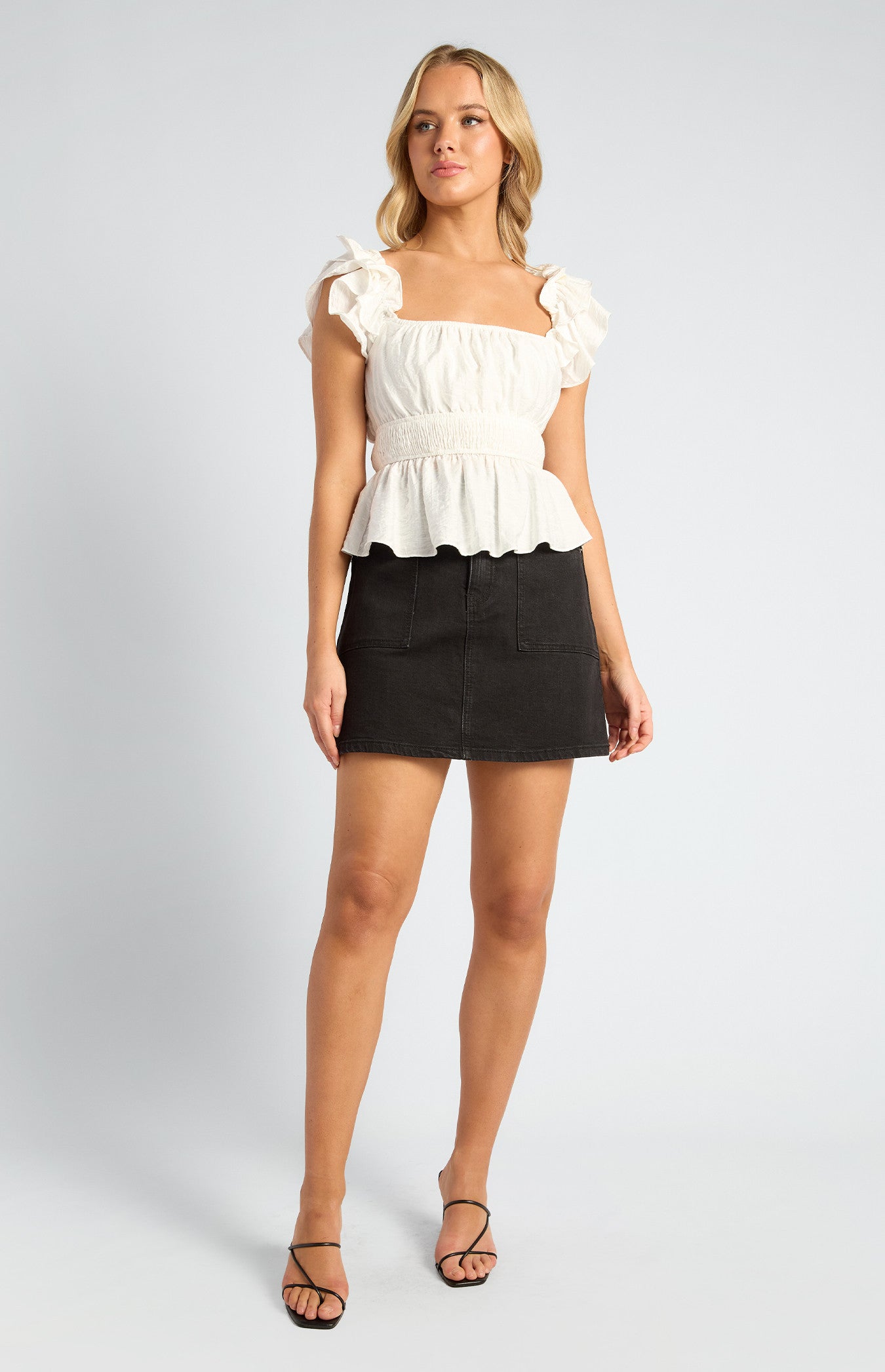 Black denim mini skirt